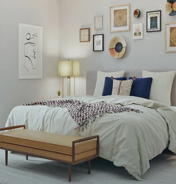 Stijlvol ingerichte slaapkamer met opgemaakt bed